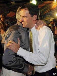 Andrew Romanoff, right, candidate in the Democratic primary race for the US Senate seat in Colorado, is hugged by a supporter in Denver after losing to incumbent Democrat Michael Bennet