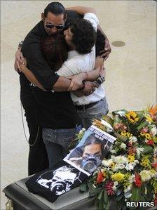 Mourners at the funeral of El Diario photographer Luis Carlos Santiago on 18 September