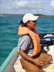 Man-chan driving the protesters' boat off Camp Schwab