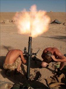 Soldiers of the Welsh Guards mortar platoon firing on Taliban positions in Helmand Province, Afghanistan.