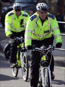 Two cycling Policemen