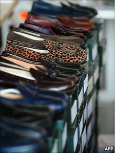 Shoes which belonged to Bernie Madoff, are displayed during an auction press preview, New York, November 2010