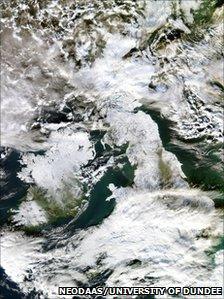 A satellite image showing Britain wrapped in a blanket of snow.