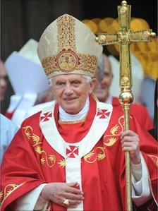 Pope Benedict XVI carrying the papal cross outside Westminster Cathedral in September 2010