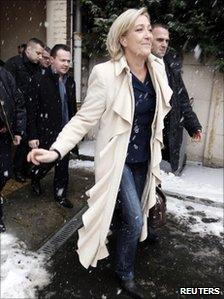 Marine Le Pen, France's far-right National Front vice-president and European deputy, arrives for the last stage of her campaign for the party's primary election in Henin Beaumont, 19 December 2010