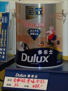 Tin of Dulux paint on a shelf in China