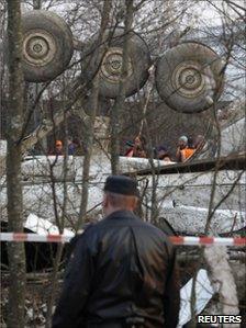 A Russian serviceman guards the wreckage of the Polish plane (file pic April 2010)