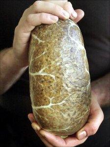 Hands holding haggis