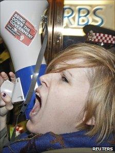 Demonstrators protest over bankers' bonuses outside offices of RBS in London, 14 January 2011