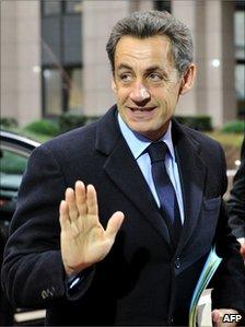 French President Nicolas Sarkozy arrives for the summit in Brussels, 4 February