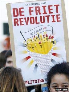 placard saying "chips revolution" (17 Feb 2011)