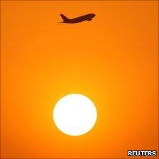 Passenger jet and the Sun