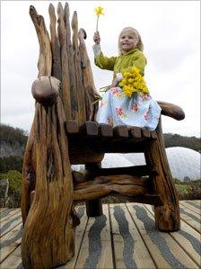 Grace, three, tries out the chair at its new location