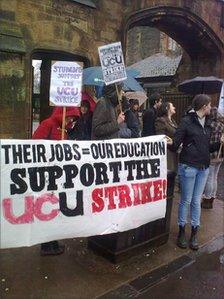 Members of the UCU on a picket line outside the University of Glasgow