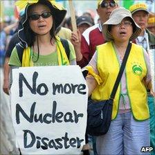 Demonstrators protest against the construction of a local nuclear power plant in in Taipei, Taiwan, on Sunday