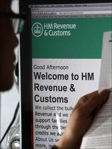 Man looks at an HMRC website