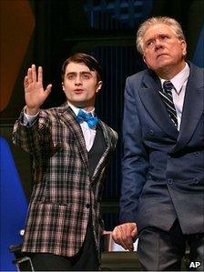 Daniel Radcliffe and John Larroquette in How to Succeed in Business Without Even Trying