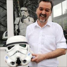 Andrew Ainsworth with a Stormtrooper helmet