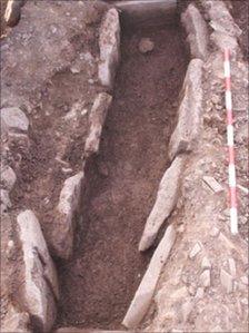 An excavated grave