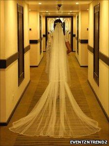 Bride in the hallway with view of her train