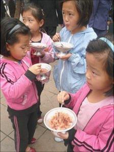 North Korean children eating