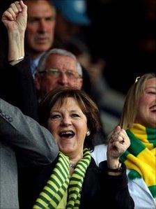 Delia Smith leads the Norwich City fans in celebration as they are promoted to the Premier League