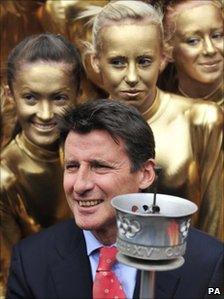 London 2012 chairman Lord Coe holding the Olympic torch