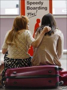 Passengers at Glasgow Airport in Scotland