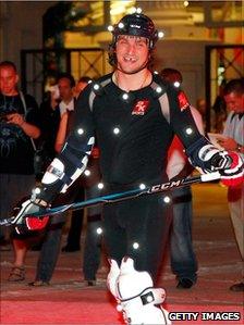 Ice hockey player Alex Ovechkin wears a motion capture suit