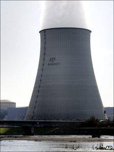 Environmentalist group Greenpeace activists are suspended next to protest banner on one of the cooling towers of the nuclear plant of Belleville-sur-Loire, central France, in March 2007