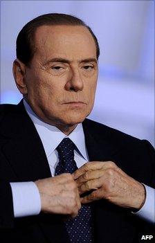 Italian Prime Minister Silvio Berlusconi attends a television programme in Rome, 25 May