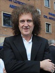 Brian May outside court