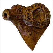 Ram's head from an item of medieval pottery found in pieces at Cosmeston