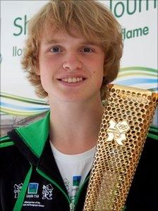 Eddie Graver with the Olympic torch prototype