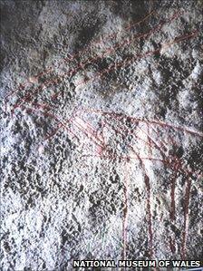 Wall carving in Gower cave