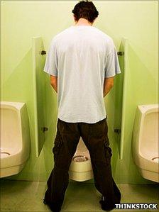 Man at urinals