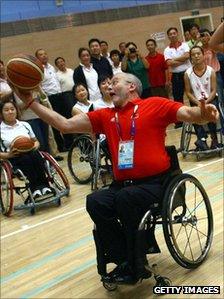 Sir Philip Craven playing basketball