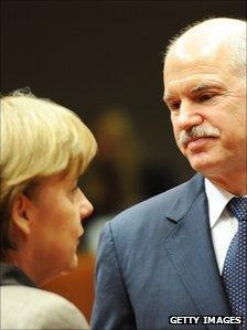 German Chancellor Angela Merkel (left) and Greek Prime Minister George Papandreou