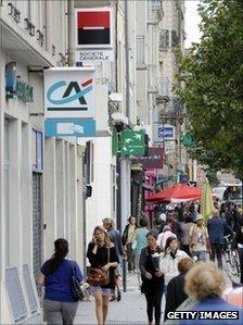 Signs of three French banks on street in Rennes