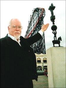 Sir Peter Blake with his artwork in Blackpool