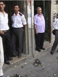 Security forces outside Hassan Abdul Azim's office in Damascus, Syria (29 Sept 2011)