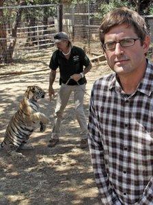 In Oklahoma, Louis met tiger Sarg and owner Joe Exotic, who runs an animal park