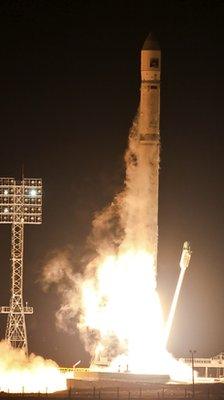 Flash of light with launching rocket
