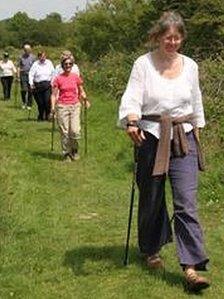 People walking in Coed Geufron near Aberystwyth