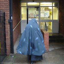 Woman walking in to the health centre