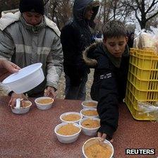 Poor Hungarians receiving food handouts in Budapest, 22 Nov 11