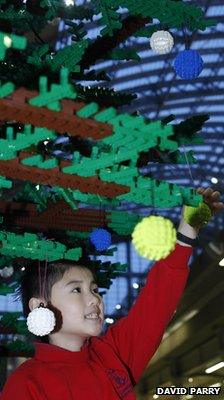 Child with Lego Christmas tree