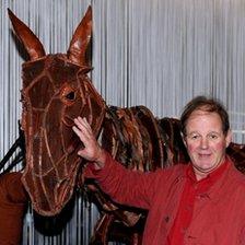 War Horse author Michael Morpurgo (right) with Joey, the large stage puppet from the National Theatres War Horse production. Pic: Georgie Gillard/PA Wire