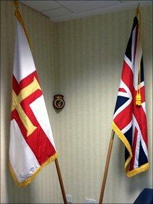 The Union Jack and Guernsey's Flag.