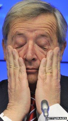 Jean-Claude Juncker wiping his eyes